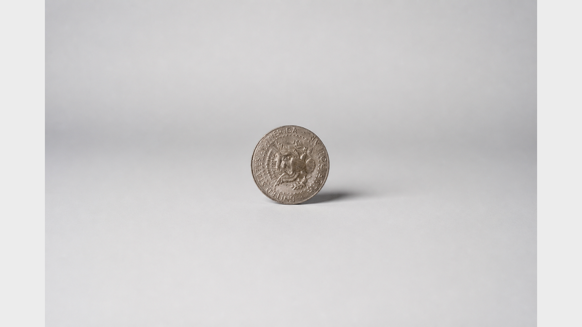 Half Dollars regular one roll of 20 coins - Trick on a neutral studio background