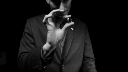 Performing with 'Blackbird' – a sleek and innovative magic utility device available at 52Kards