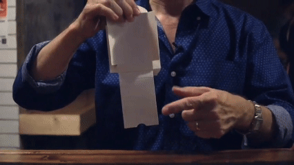david regal performing sudden deck where he produces a deck from an empty tuck box