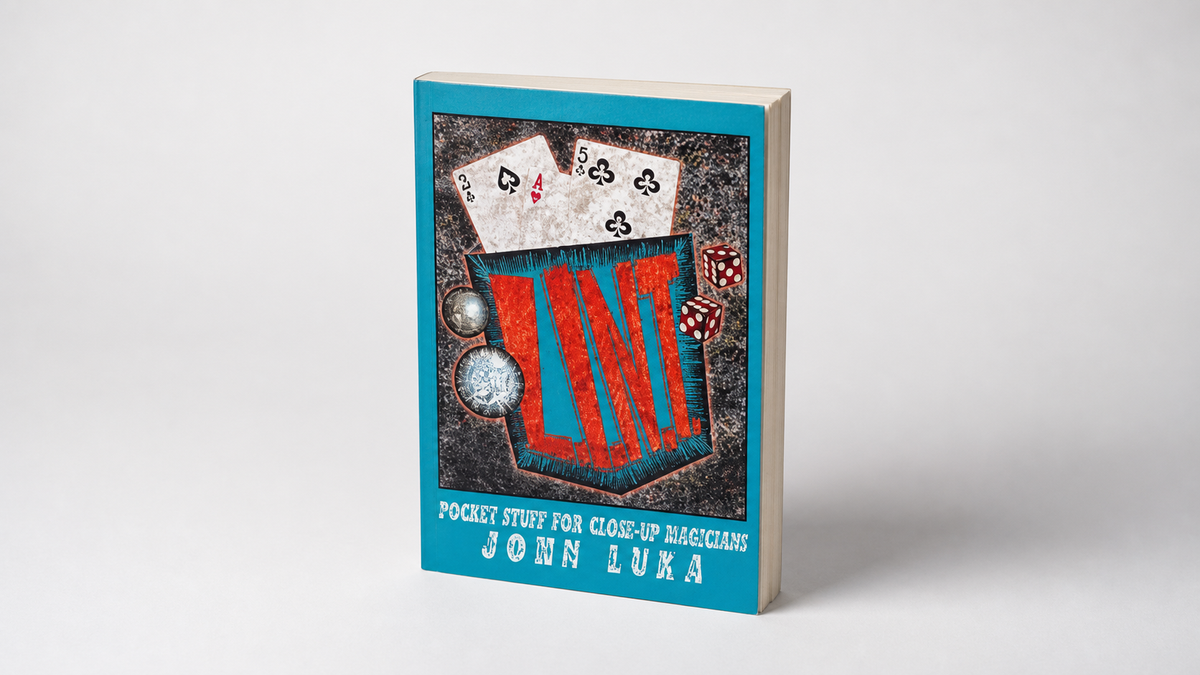 LINT by John Luka - Book on a neutral studio background