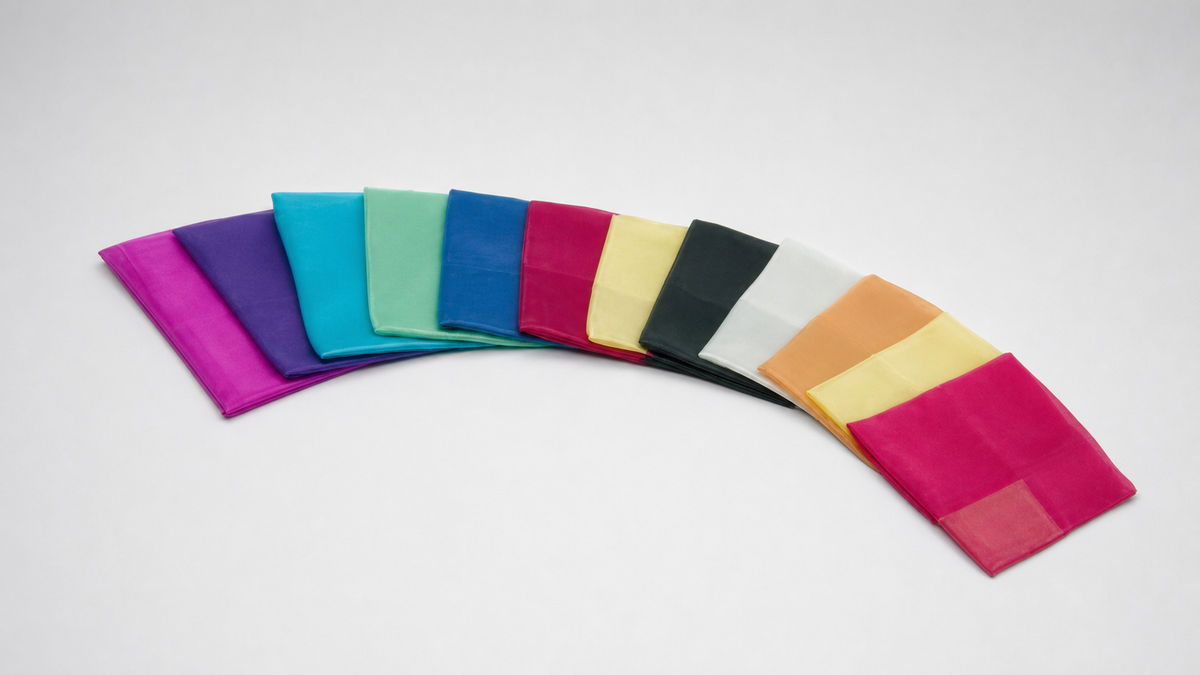Silks 9 inch 12 Pack (Assorted) Magic by Gosh - Trick on a neutral studio background