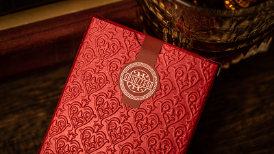 Back of the red NOC Luxury tuck box with a circular seal emblem