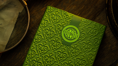 Back of the green NOC Luxury tuck box with a circular seal emblem