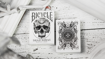 Bicycle Dead Soul II tuck box standing beside an upright card back