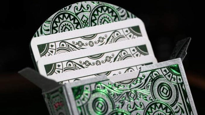 Green foiled and white patterned tuck box 