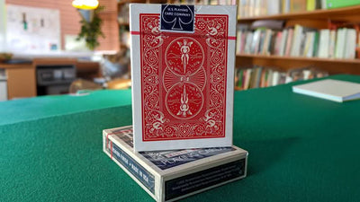 Red Bicycle Rider Back card standing upright on a blue tuck box