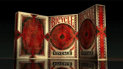 Three Bicycle Vintage tuck boxes standing together, showing the front and back designs