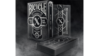Bicycle Double Black tuck box standing behind a squared deck and upright card back