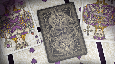 Bicycle Black Magic card back centered over purple and green face-up court cards