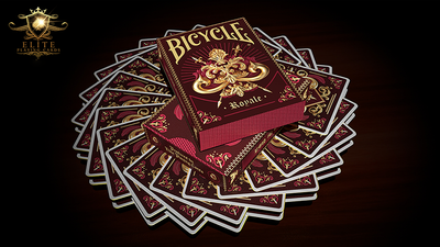 Bicycle Royale tuck box resting on a circular arrangement of overlapping card backs