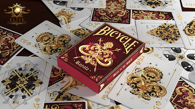 Bicycle Royale tuck box lying on scattered card backs and face-up court cards