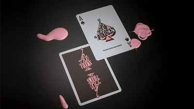 Casino Femme Fatale Ace of Spades and card back surrounded by small pink shapes