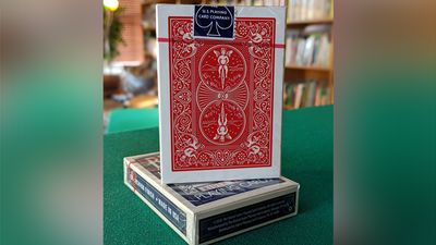 Red Bicycle Rider Back card standing upright on a blue tuck box
