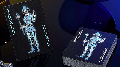 Bicycle Ice Joker card beside a squared deck topped with a second Joker