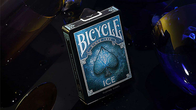 Bicycle Ice tuck box standing upright against a dark blue reflective background