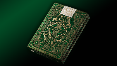 Back of the green Slytherin Harry Potter tuck box with ornate gold artwork and a white seal