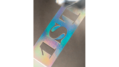 Close-up of holographic 1ST lettering on the side of the tuck box