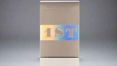 Beige 1ST V5 tuck box with a holographic 1ST logo on the front